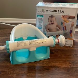 My bath seat by Summer! Supports baby in bath tub